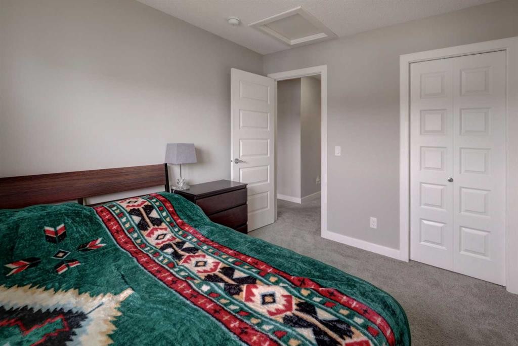 52 Red Embers Manor Ne, Calgary, AB - Indoor Photo Showing Bedroom