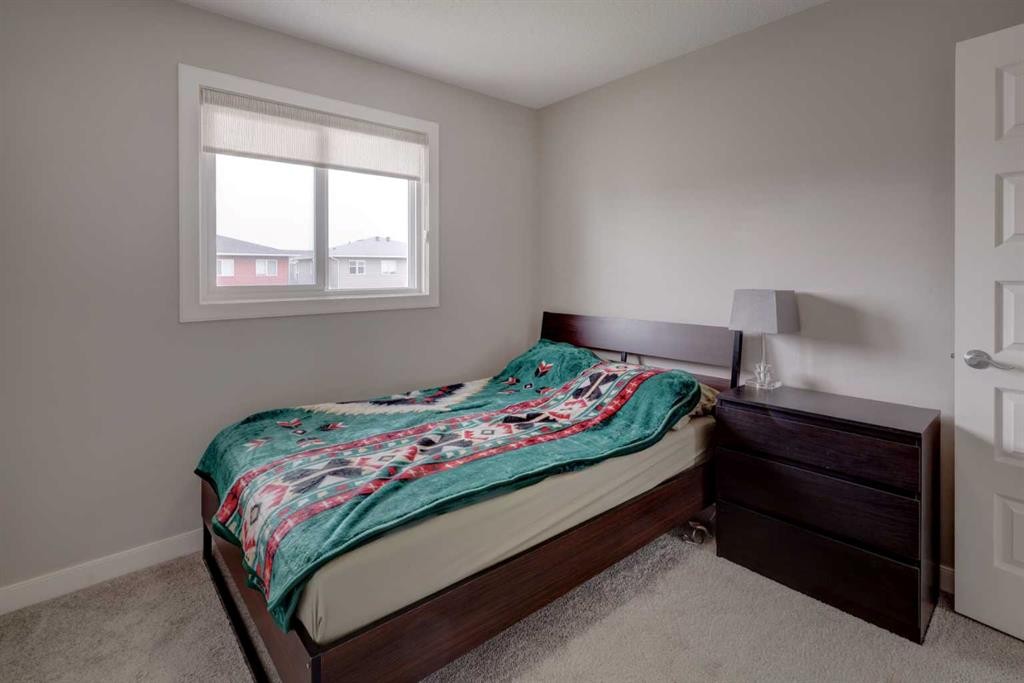 52 Red Embers Manor Ne, Calgary, AB - Indoor Photo Showing Bedroom