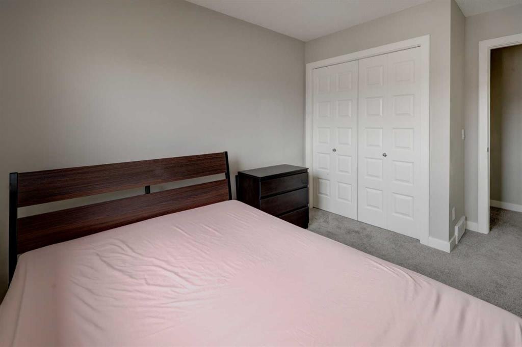 52 Red Embers Manor Ne, Calgary, AB - Indoor Photo Showing Bedroom