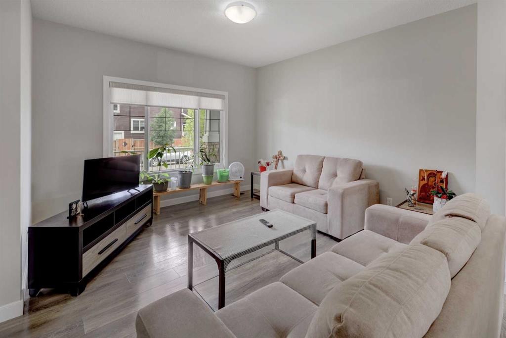 52 Red Embers Manor Ne, Calgary, AB - Indoor Photo Showing Living Room