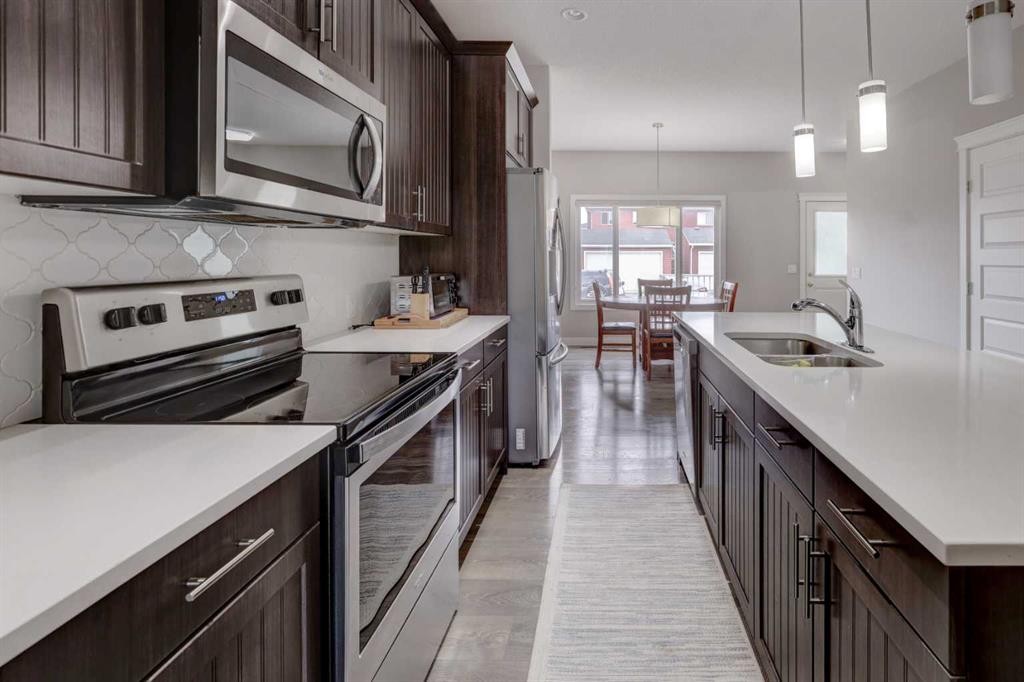 52 Red Embers Manor Ne, Calgary, AB - Indoor Photo Showing Kitchen With Double Sink With Upgraded Kitchen