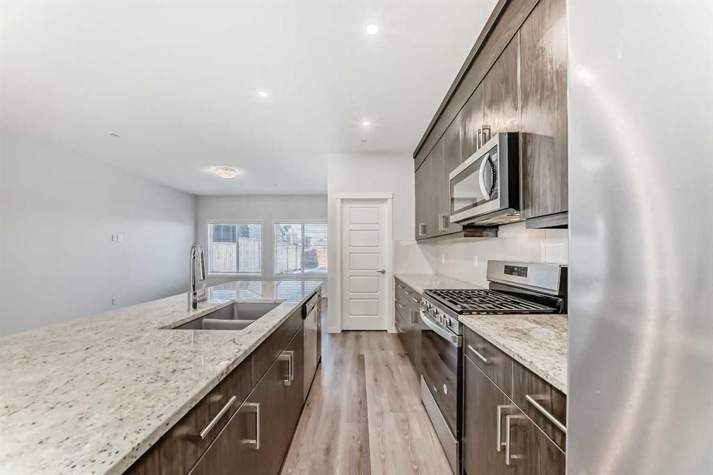 272 Livingston View Nw, Calgary, AB - Indoor Photo Showing Kitchen With Double Sink With Upgraded Kitchen