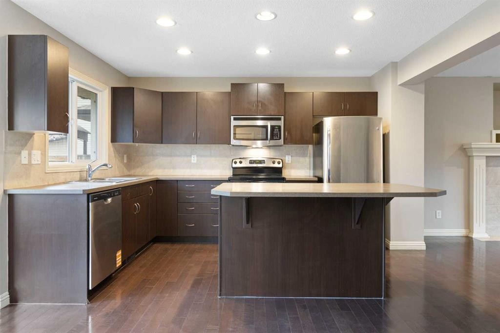 221 Prestwick Terrace Se, Calgary, AB - Indoor Photo Showing Kitchen With Upgraded Kitchen