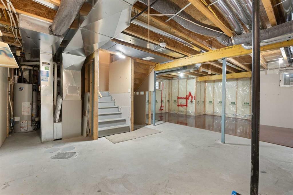 221 Prestwick Terrace Se, Calgary, AB - Indoor Photo Showing Basement