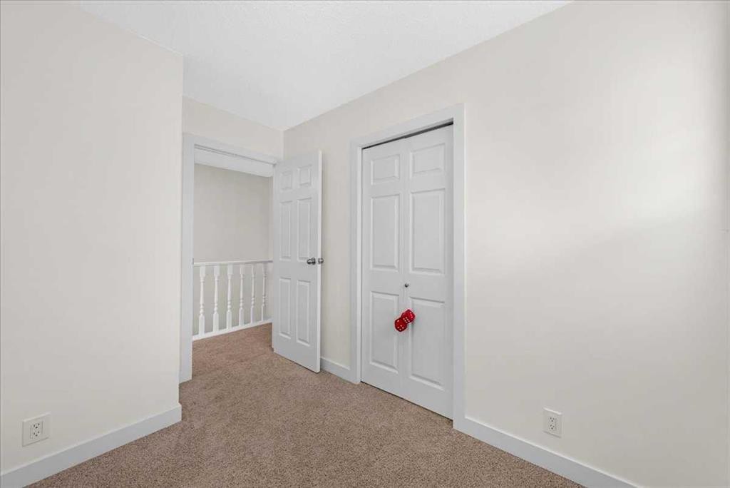 61 Falmere Way Ne, Calgary, AB - Indoor Photo Showing Other Room