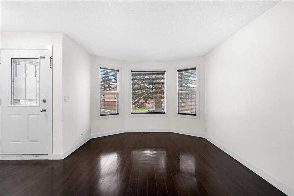 61 Falmere Way Ne, Calgary, AB - Indoor Photo Showing Other Room