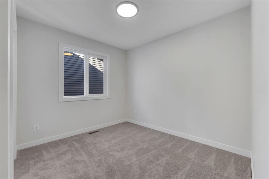 351 Fireside Drive, Cochrane, AB - Indoor Photo Showing Other Room