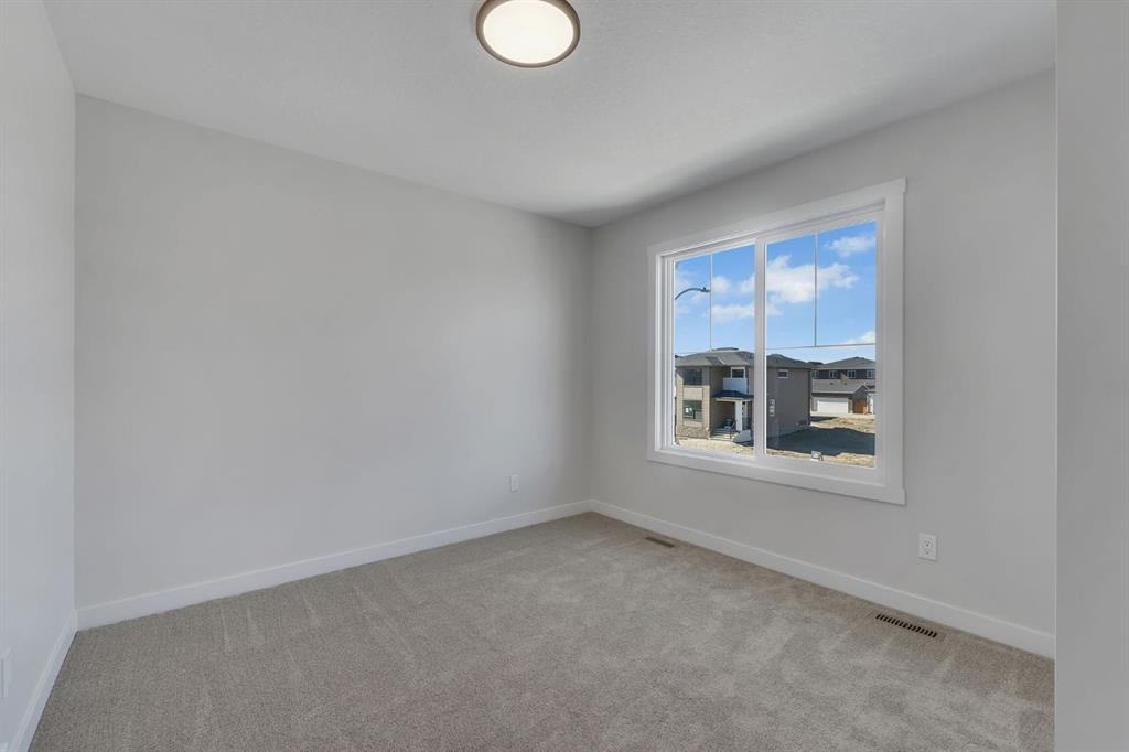 351 Fireside Drive, Cochrane, AB - Indoor Photo Showing Other Room