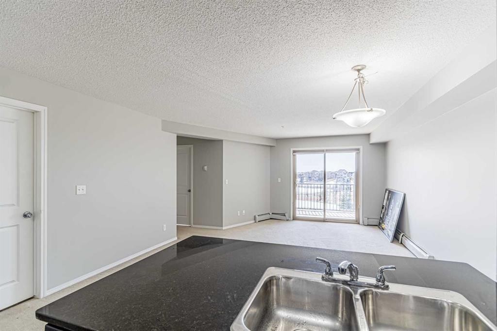 316-5 Saddlestone Way Ne, Calgary, AB - Indoor Photo Showing Kitchen