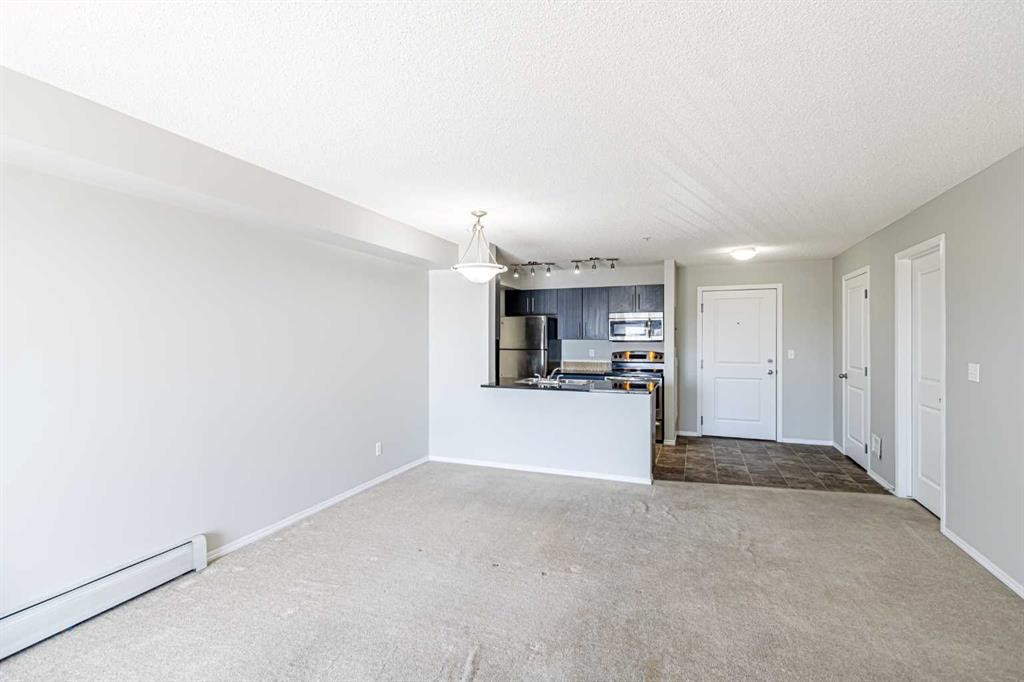 316-5 Saddlestone Way Ne, Calgary, AB - Indoor Photo Showing Other Room