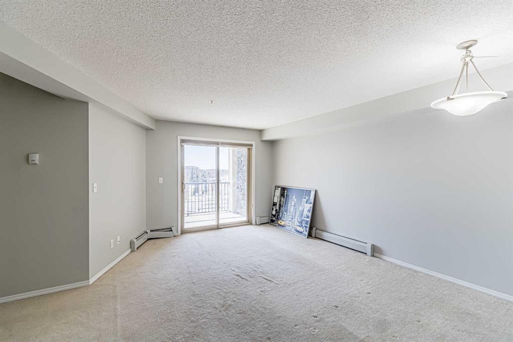 316-5 Saddlestone Way Ne, Calgary, AB - Indoor Photo Showing Other Room