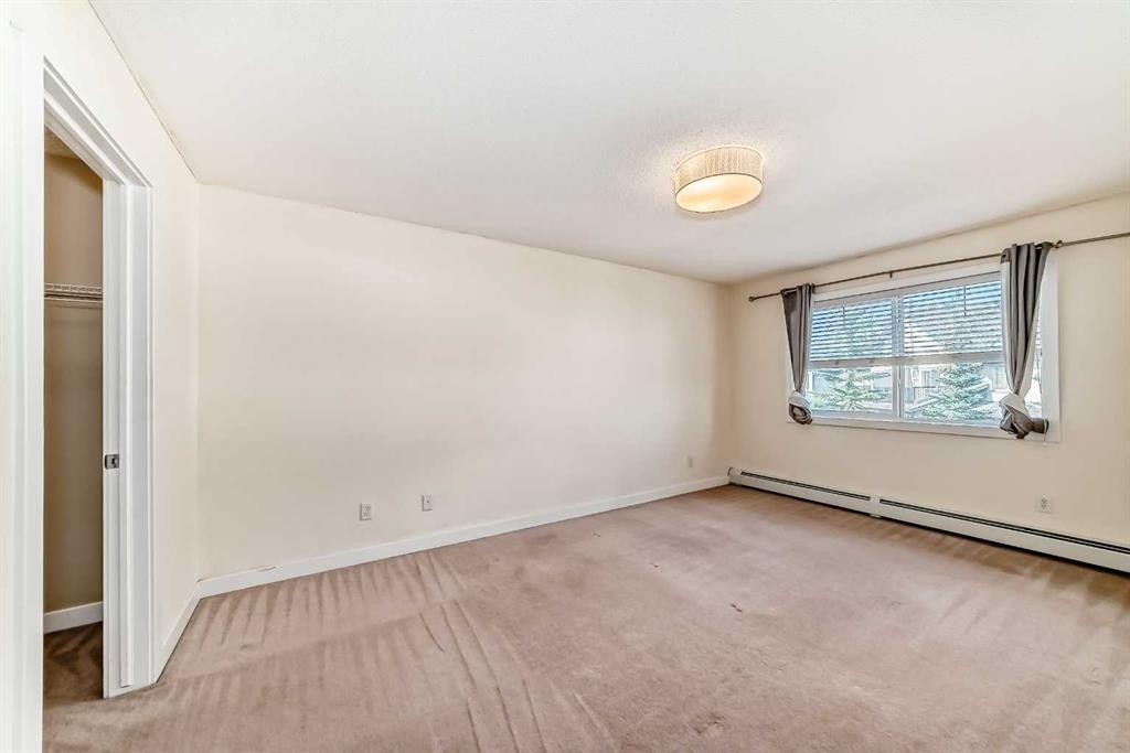 2210-211 Aspen Stone Boulevard Sw, Calgary, AB - Indoor Photo Showing Other Room