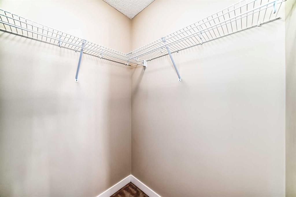 2210-211 Aspen Stone Boulevard Sw, Calgary, AB - Indoor With Storage