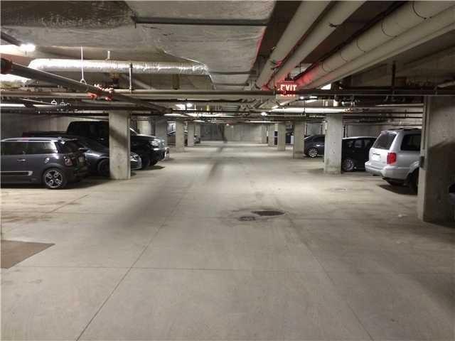 2210-211 Aspen Stone Boulevard Sw, Calgary, AB - Indoor Photo Showing Garage