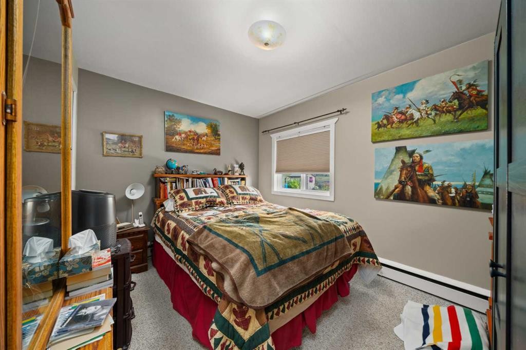 830230 Highway 1X, Rural Bighorn No. 8, M.D. Of, AB - Indoor Photo Showing Bedroom