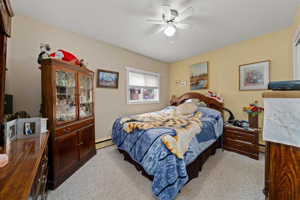 830230 Highway 1X, Rural Bighorn No. 8, M.D. Of, AB - Indoor Photo Showing Bedroom