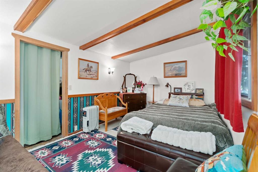 830230 Highway 1X, Rural Bighorn No. 8, M.D. Of, AB - Indoor Photo Showing Bedroom