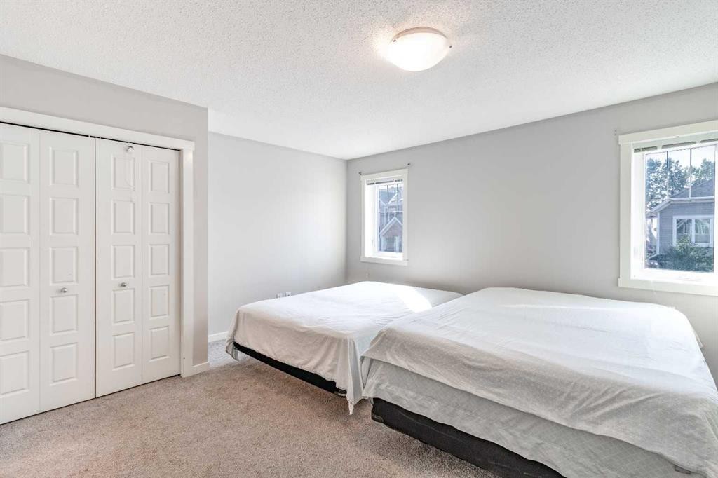 1016-7451 Falconridge Boulevard Ne, Calgary, AB - Indoor Photo Showing Bedroom