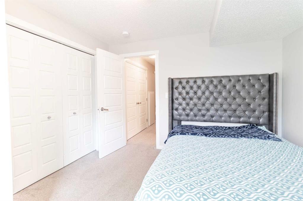 1016-7451 Falconridge Boulevard Ne, Calgary, AB - Indoor Photo Showing Bedroom