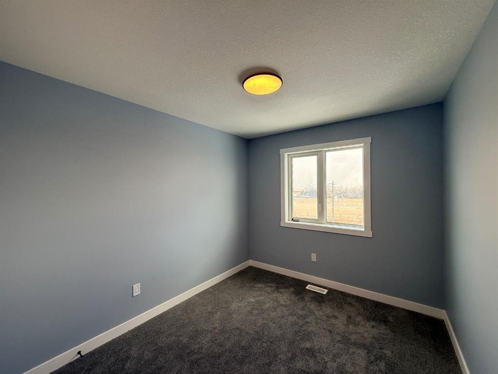 1999 Mccaskill Drive, Crossfield, AB - Indoor Photo Showing Other Room