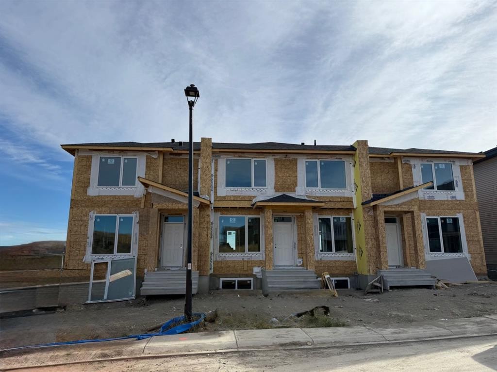 1997 Mccaskill Drive, Crossfield, AB - Outdoor With Deck Patio Veranda With Facade