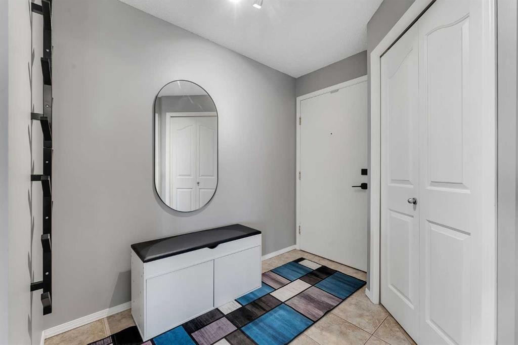 8328-304 Mackenzie Way Sw, Airdrie, AB - Indoor Photo Showing Other Room