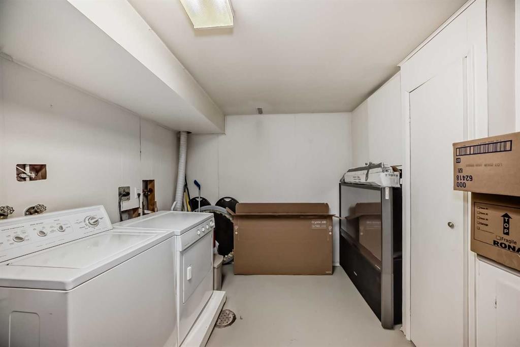 554 Whitehill Place Ne, Calgary, AB - Indoor Photo Showing Laundry Room