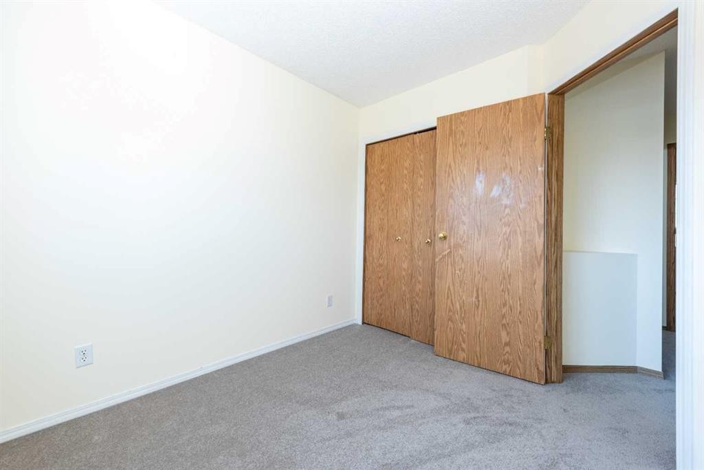 216 Hidden Hills Road Nw, Calgary, AB - Indoor Photo Showing Other Room
