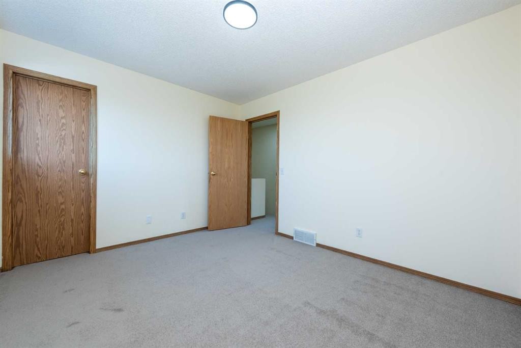 216 Hidden Hills Road Nw, Calgary, AB - Indoor Photo Showing Other Room