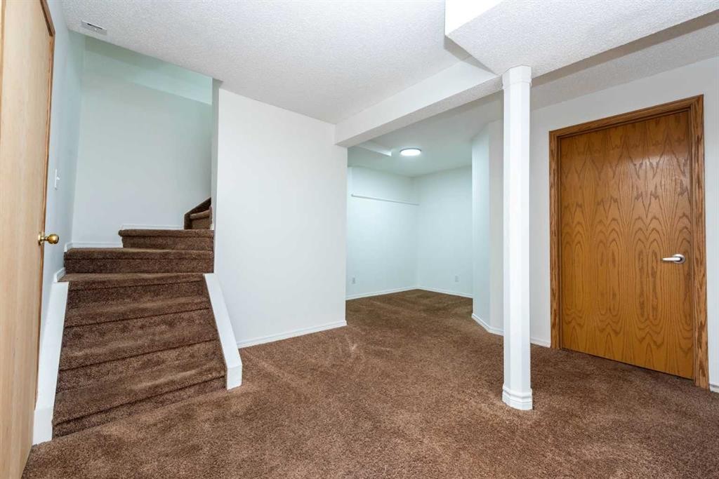 216 Hidden Hills Road Nw, Calgary, AB - Indoor Photo Showing Other Room