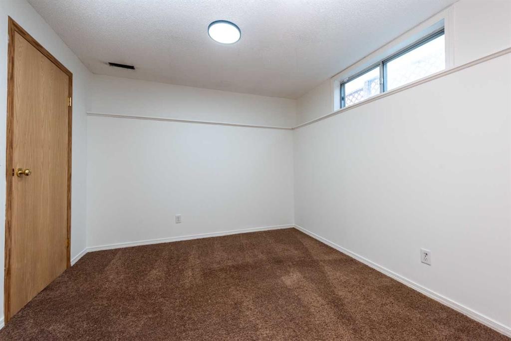 216 Hidden Hills Road Nw, Calgary, AB - Indoor Photo Showing Other Room