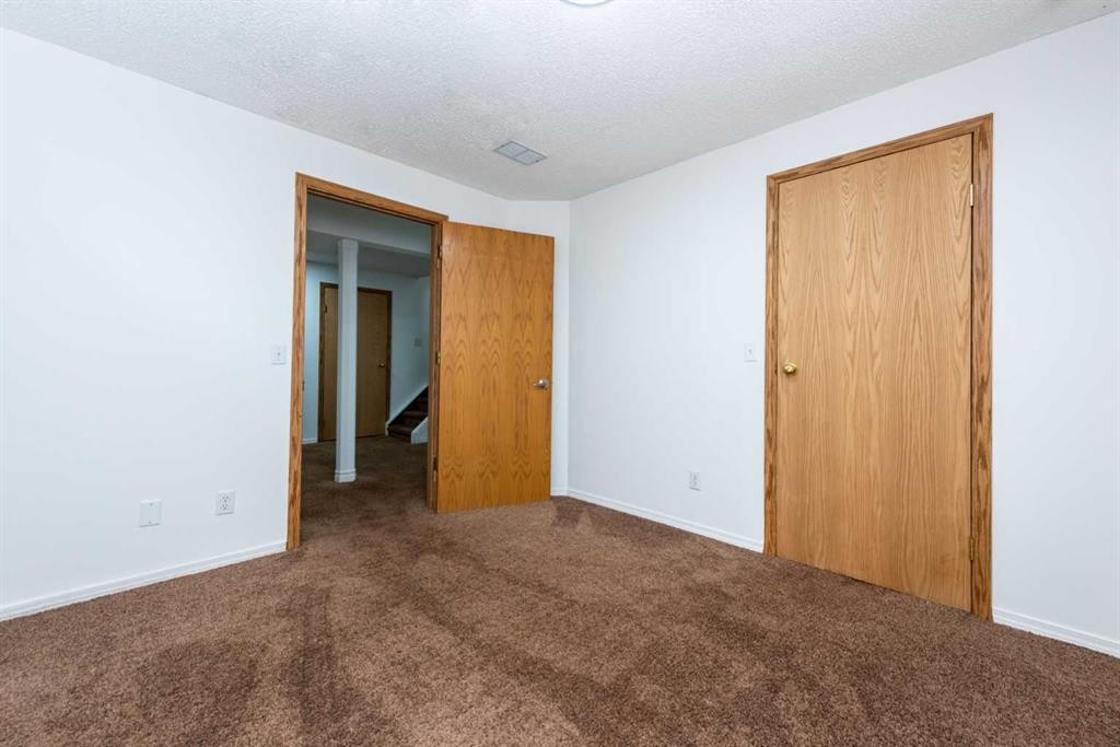 216 Hidden Hills Road Nw, Calgary, AB - Indoor Photo Showing Other Room