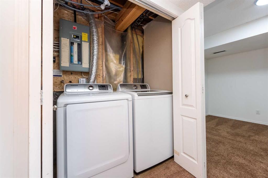 216 Hidden Hills Road Nw, Calgary, AB - Indoor Photo Showing Laundry Room