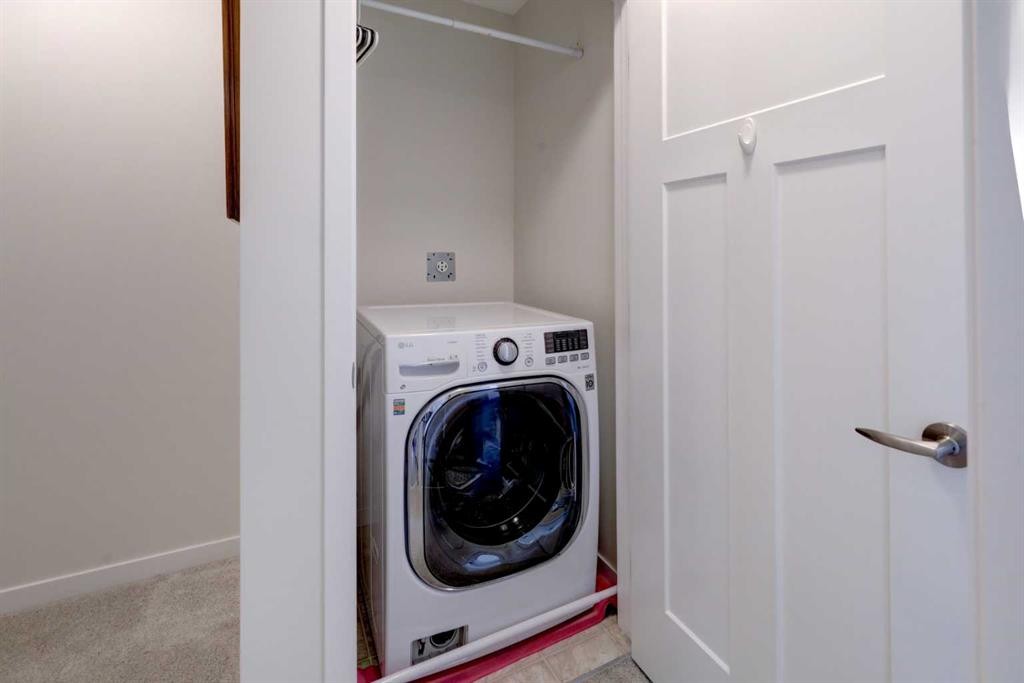 113 South Point Court Sw, Airdrie, AB - Indoor Photo Showing Laundry Room