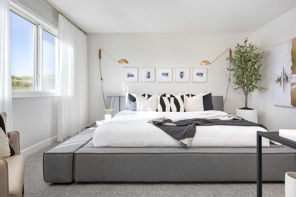 131 Wolf Creek Rise Se, Calgary, AB - Indoor Photo Showing Bedroom
