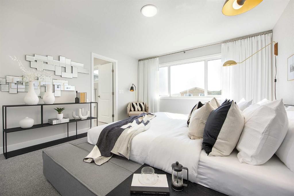131 Wolf Creek Rise Se, Calgary, AB - Indoor Photo Showing Bedroom