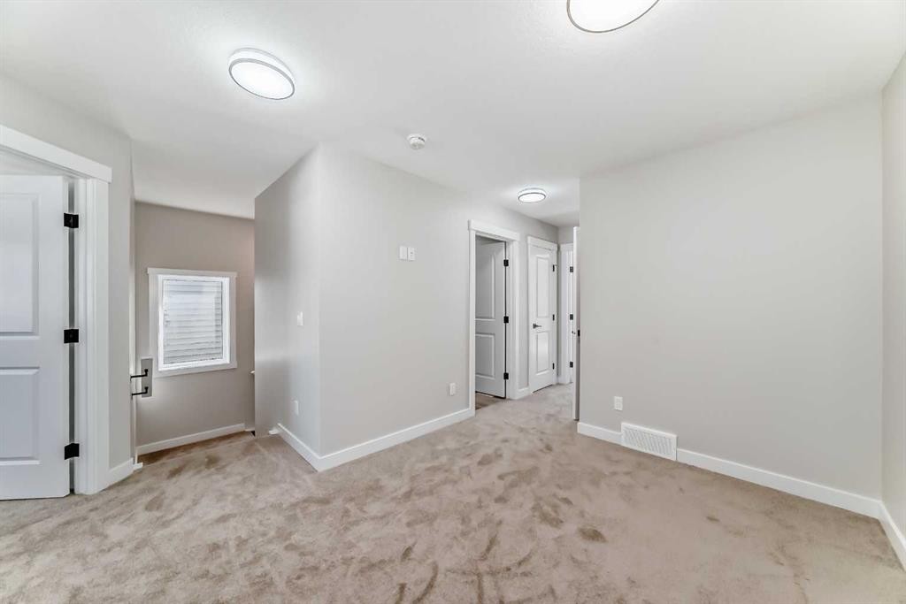 112 Belvedere Park Se, Calgary, AB - Indoor Photo Showing Other Room