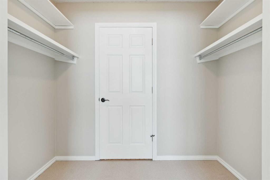 102-7416 Hunterview Drive Nw, Calgary, AB - Indoor With Storage