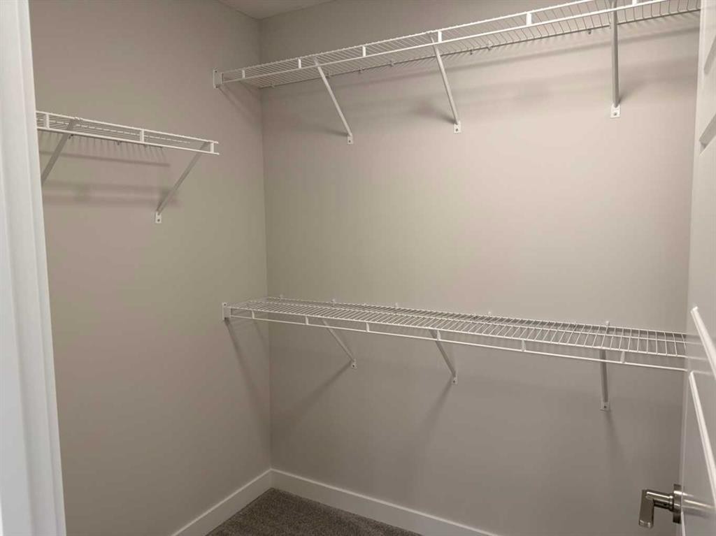 51 Sunrise Heath, Cochrane, AB - Indoor With Storage
