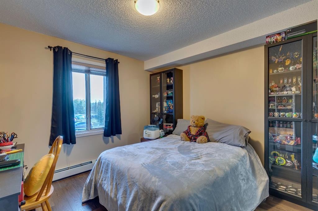2205-2518 Fish Creek Boulevard Sw, Calgary, AB - Indoor Photo Showing Bedroom