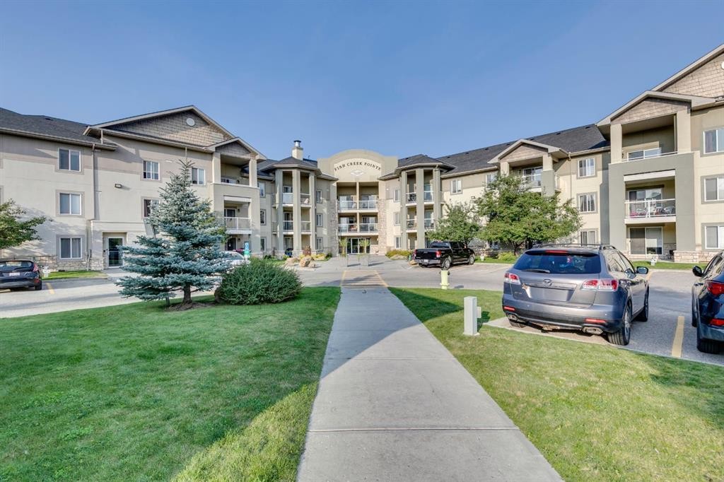 2205-2518 Fish Creek Boulevard Sw, Calgary, AB - Outdoor With Balcony With Facade