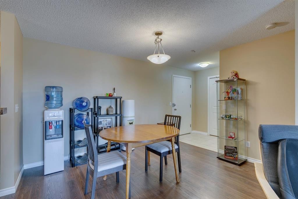 2205-2518 Fish Creek Boulevard Sw, Calgary, AB - Indoor Photo Showing Dining Room