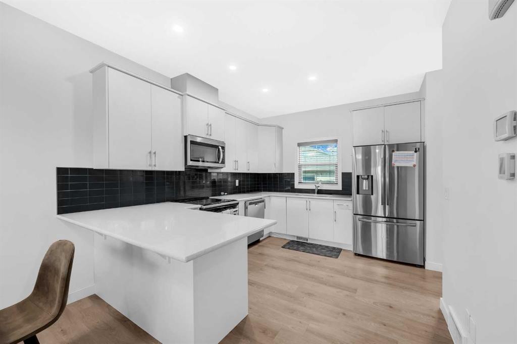46 Cornerbrook Manor Ne, Calgary, AB - Indoor Photo Showing Kitchen With Double Sink With Upgraded Kitchen