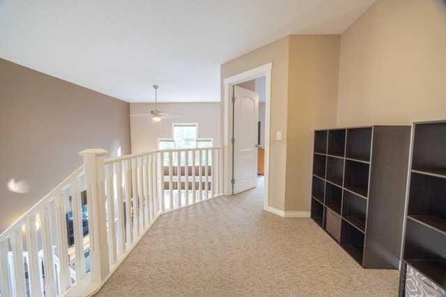 28 Crestmont Way Sw, Calgary, AB - Indoor Photo Showing Other Room