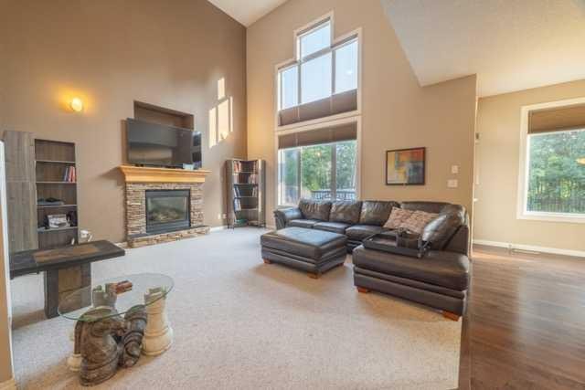 28 Crestmont Way Sw, Calgary, AB - Indoor Photo Showing Living Room With Fireplace