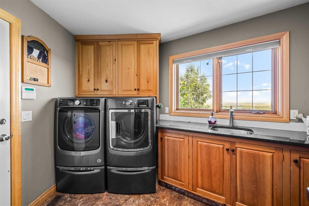 98 Equestrian Drive, Rural Rocky View County, AB - Indoor Photo Showing Laundry Room