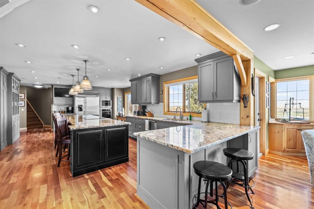 98 Equestrian Drive, Rural Rocky View County, AB - Indoor Photo Showing Kitchen With Upgraded Kitchen