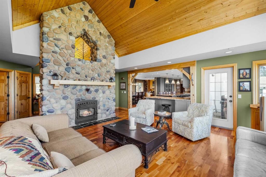 98 Equestrian Drive, Rural Rocky View County, AB - Indoor Photo Showing Living Room With Fireplace