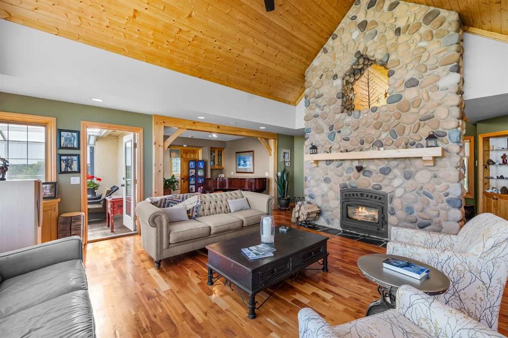 98 Equestrian Drive, Rural Rocky View County, AB - Indoor Photo Showing Living Room With Fireplace