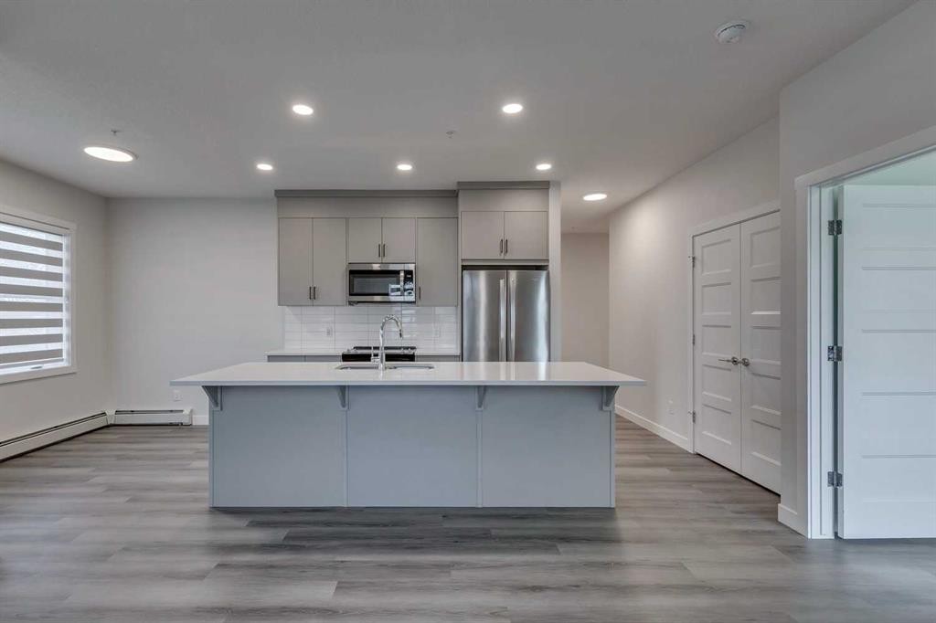 113-55 Wolf Hollow Crescent Se, Calgary, AB - Indoor Photo Showing Kitchen With Upgraded Kitchen